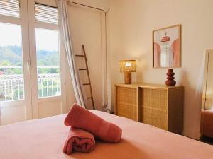 Voodi või voodid majutusasutuse Appartement Ti Balcon - Plage à 20m toas