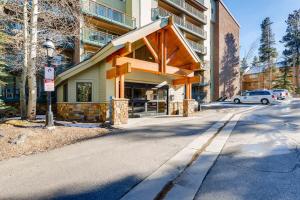 a building on a street with a car parked in front at Ski In and Out, Luxury, 1 Blk to Main, Pool, Hot Tub, Sauna in Breckenridge