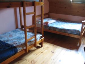 Postel nebo postele na pokoji v ubytování Albergue Pájaro Loco