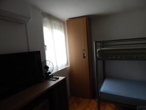 Voodi või voodid majutusasutuse LiMa Apartman Ház toas