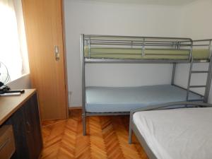 Voodi või voodid majutusasutuse LiMa Apartman Ház toas