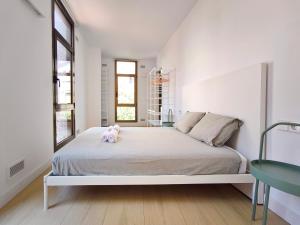 Postel nebo postele na pokoji v ubytování Apartamento céntrico, moderno, Terrassa Rambla