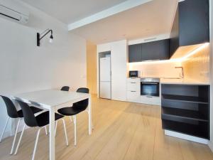Kuchyň nebo kuchyňský kout v ubytování Apartamento céntrico, moderno, Terrassa Rambla