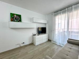 Et tv og/eller underholdning på Santa Clotilde Family Apartment