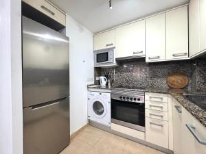 Køkken eller tekøkken på Santa Clotilde Family Apartment