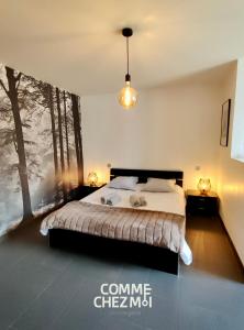 Ένα ή περισσότερα κρεβάτια σε δωμάτιο στο Gîte Charmant D'Olympe