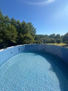 Bazén v ubytování Glamping in Tuscany nebo v jeho okolí
