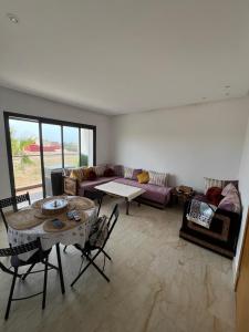 Χώρος καθιστικού στο Garden Bay Appartement Familial