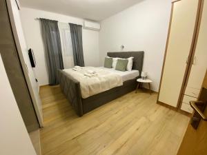 Posteľ alebo postele v izbe v ubytovaní Apartments Adaleta