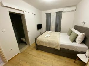 Posteľ alebo postele v izbe v ubytovaní Apartments Adaleta
