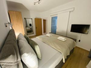 Posteľ alebo postele v izbe v ubytovaní Apartments Adaleta