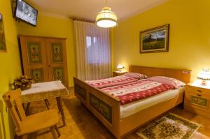 Postel nebo postele na pokoji v ubytování Tirol in Balin - La Stua