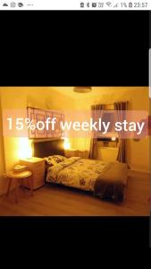 Ένα ή περισσότερα κρεβάτια σε δωμάτιο στο Homestay cambridge central