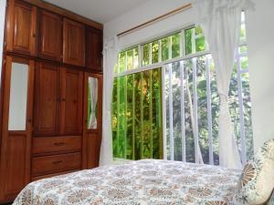 Postel nebo postele na pokoji v ubytování Relax in the Amazon, Tena + 25 fotografií