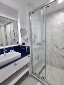 Koupelna v ubytování Downtown Comfort Roomy Studio in Orbi