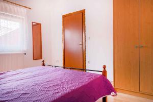 Łóżko lub łóżka w pokoju w obiekcie Apartment Pula 2