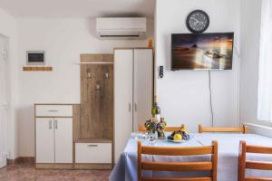 Telewizja i/lub zestaw kina domowego w obiekcie Apartment Pula 2
