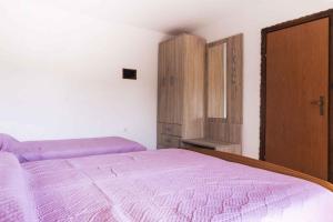 Łóżko lub łóżka w pokoju w obiekcie Apartment Pula 2