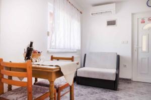 Łóżko lub łóżka w pokoju w obiekcie Apartment Pula 2