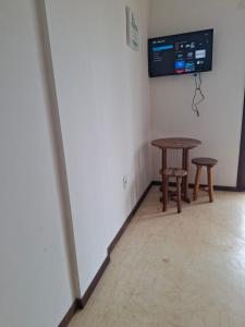Μια τηλεόραση ή/και κέντρο ψυχαγωγίας στο Suites Gostoso