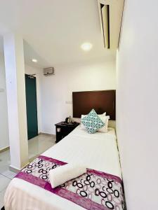 Postel nebo postele na pokoji v ubytování Hotel Sagittario