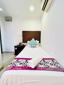 Postel nebo postele na pokoji v ubytování Hotel Sagittario