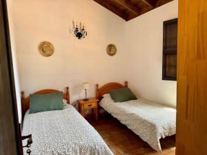 Ένα ή περισσότερα κρεβάτια σε δωμάτιο στο Casa Castro +13 φωτογραφίες