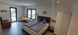 Posezení v ubytování BikeHikeSleep Apartments