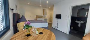 Kuchyň nebo kuchyňský kout v ubytování BikeHikeSleep Apartments