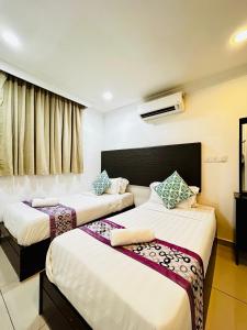 Postel nebo postele na pokoji v ubytování Hotel Sagittario