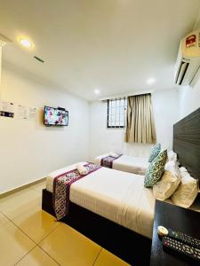 Postel nebo postele na pokoji v ubytování Hotel Sagittario