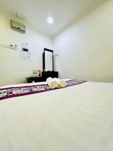Postel nebo postele na pokoji v ubytování Hotel Sagittario