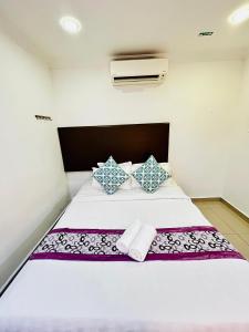 Postel nebo postele na pokoji v ubytování Hotel Sagittario