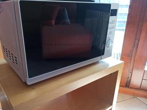 Televízia a/alebo spoločenská miestnosť v ubytovaní Larix Cervinia apartment Vda Vacanze in Vetta - CIR 0322