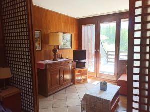 Televízia a/alebo spoločenská miestnosť v ubytovaní Larix Cervinia apartment Vda Vacanze in Vetta - CIR 0322