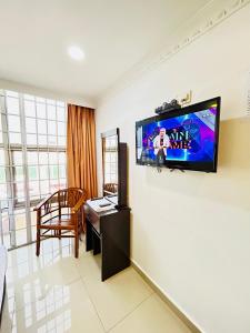 TV a/nebo společenská místnost v ubytování Hotel Sagittario