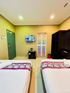 Postel nebo postele na pokoji v ubytování Hotel Sagittario