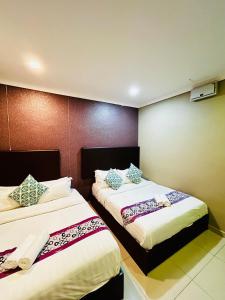 Postel nebo postele na pokoji v ubytování Hotel Sagittario