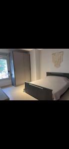 a bedroom with a bed and a window at Your Getaway to Adventure in Ain Sokhna