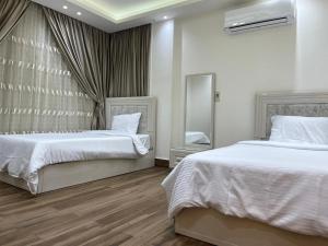 Postel nebo postele na pokoji v ubytování Dar Residence - Madinaty B12 - U1 - 3 BR - New Cairo