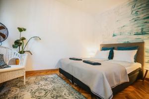 Postel nebo postele na pokoji v ubytování Villa Bohemia