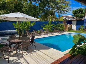 Bazén v ubytování Casa Brisa - WiFi, PISCINA e CAFÉ DA MANHÃ a 520m do CENTRO DE ARRAIAL nebo v jeho okolí