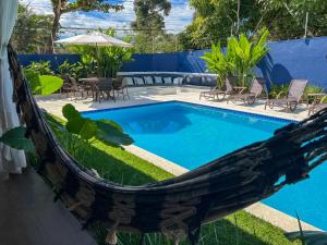 Bazén v ubytování Casa Brisa - WiFi, PISCINA e CAFÉ DA MANHÃ a 520m do CENTRO DE ARRAIAL nebo v jeho okolí