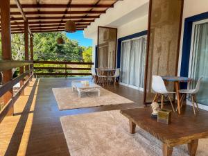 Balkón nebo terasa v ubytování Casa Brisa - WiFi, PISCINA e CAFÉ DA MANHÃ a 520m do CENTRO DE ARRAIAL