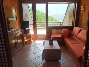 Televízia a/alebo spoločenská miestnosť v ubytovaní Larix Cervinia apartment Vda Vacanze in Vetta - CIR 0322