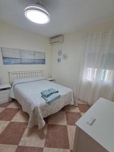 Posteľ alebo postele v izbe v ubytovaní Casa la Viña- ALQUILER FAMILIAS Y PAREJAS