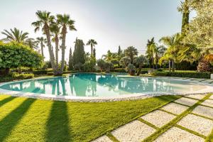 Bazén v ubytovaní Il Giardino degli Dei alebo v jeho blízkosti