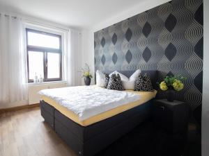 En eller flere senge i et værelse på Auer Talblick