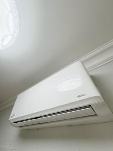 a white ceiling with a laptop on top of it at Premium Jumbo Apartment in Chişinău +18 photos