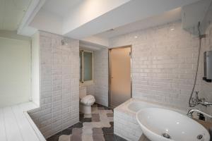 Vannituba majutusasutuses 慶爾喜旅館長沙館Cheers Loft Self Check-in Hotel